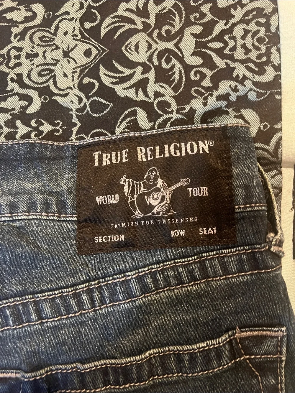 True Religion ROCCO faded dark blue jeans with whiskering